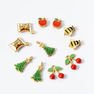 Colorful enamel Christmas charms set including apple, tree, and candy pendants in titanium steel
