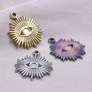 Detailed view of evil eye charms in gold, silver and rainbow finishes for DIY necklaces