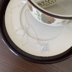Minimalist S925 sterling silver starburst pendant necklace with white zircon inlays