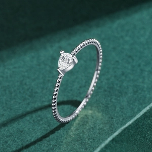 Elegant silver twisted double layer ring with pear-shaped cubic zirconia on a stone base