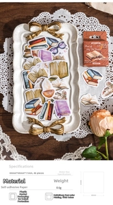 Vintage style book stickers box featuring illustrations of books, glasses and candles