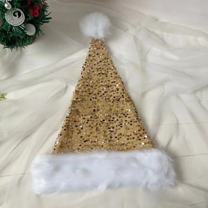 Detail of festive Christmas hat featuring shiny gold sequins and white faux fur trim