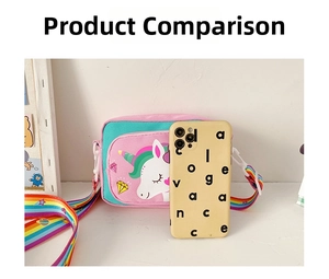 Mini unicorn shoulder bag with rainbow strap compared to phone showing compact size