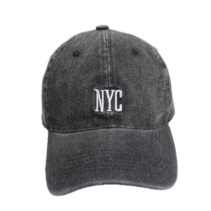 Retro washed black denim baseball cap with white NYC embroidery and curved brim