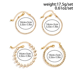 Detailed size view of a 4-piece gold tennis bracelet set with white rhinestones