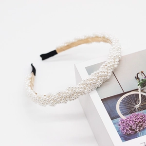 Elegant woven pearl headband for women featuring high-quality champagne gold base inlay