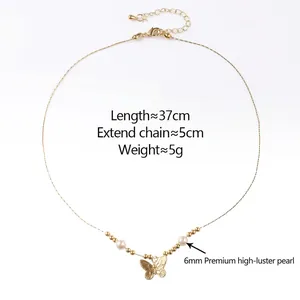 Golden butterfly necklace with high-luster pearls and copper beads on white background