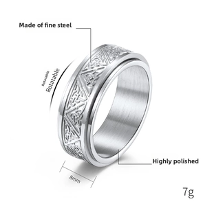 Detail view of 8mm stainless steel spinner ring with Celtic knot patterns for anxiety relief
