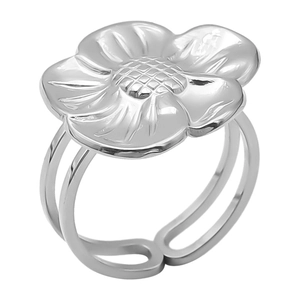 Macro detail of silver floral open ring with textured petals and adjustable band