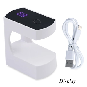 Mini UV LED nail lamp with digital display and USB cable in clean white minimalist design