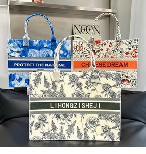Detailed close-up of blue porcelain print felt tote bags with elegant floral patterns