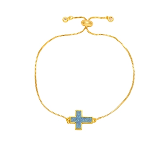 Fashionable gold plated cross bracelet with blue glitter inlay and adjustable slide clasp
