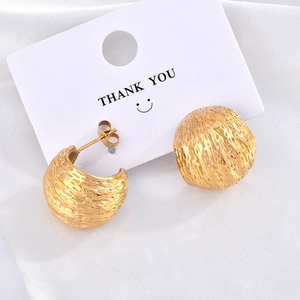 Chic French style golden C-shaped hoop earrings with textured brushed metal finish