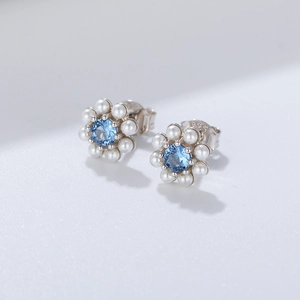 Elegant S925 silver flower stud earrings with blue zircon and white pearls