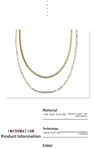 Detail of double-layer 18k gold plated titanium necklace with snake and paperclip chains
