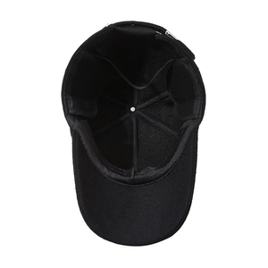Interior view of black winter baseball cap with ear protection and warm lining for elderly men
