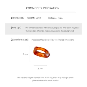 Detailed size view of resin geometric square bangle showing 8.1cm by 8.2cm dimensions