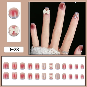 Press-on nails with pink gradient, white bow, blue heart and pearl charms, 24 pieces set