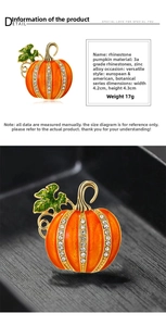 Detailed macro view showing orange enamel pumpkin brooch with crystal rhinestones