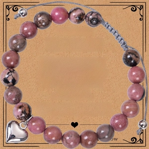 Detail of pink zebra stone bead bracelet with heart charm on teacher gift card