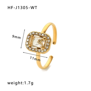 Detail view of gold adjustable ring featuring a rectangular zircon stone with micro-pavé