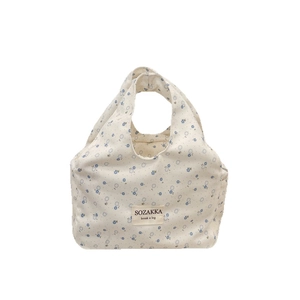 Floral canvas lunch bag with blue ditsy print and top handles for office and picnic