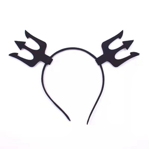 Detail view of a black devil fork headband for Halloween party and cosplay costumes