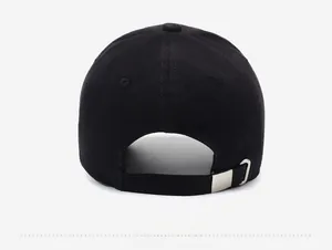 Detail of black baseball cap back with adjustable silver metal buckle and strap
