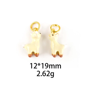 Detail of alpaca shaped jewelry charm in cream white with gold ring 12x19mm