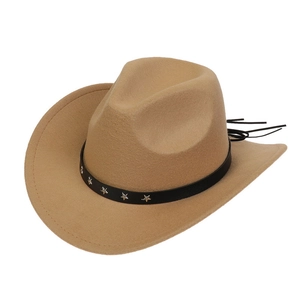 Detail of camel wool cowboy hat with silver star studs on a black faux leather band