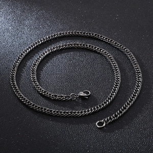 Close-up of black titanium steel Cuban chain necklace with lobster clasp and dark finish