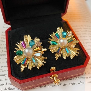 Vintage floral stud earrings with pearls and colorful crystals in a luxury jewelry box