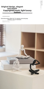 Modern abstract sculptures for home decor featuring minimalist black and white figures