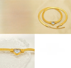 Close-up of 18K gold-plated titanium steel snake chain with heart zircon pendant
