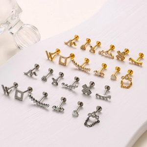 G23 titanium labret and ear stud set with zircon stones in gold and silver finishes