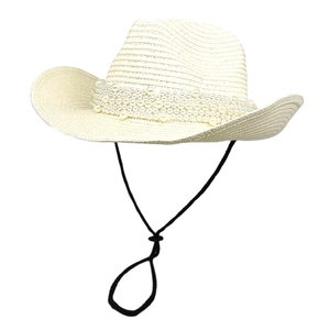 Detail of cream woven cowboy hat with layered pearl embellishments and adjustable chin strap
