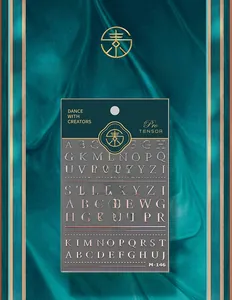 Detail of M-146 nail art stickers with metallic gold alphabet letters on green card