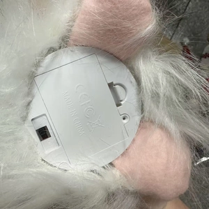 Detail view of the Christmas gnome base featuring CE FC certification and on off switch