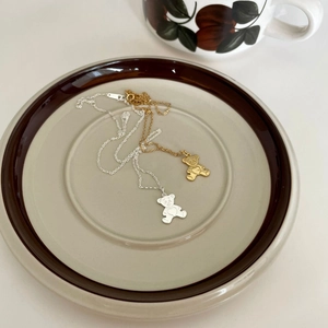 Minimalist 925 sterling silver bear pendant necklace with heart detail in gold and silver
