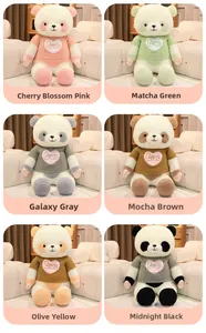 Detail of panda plush toys in six colors wearing embroidered heart love sweaters