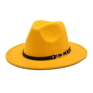 Detail of bright yellow wool fedora hat featuring black leather belt and gold buckle