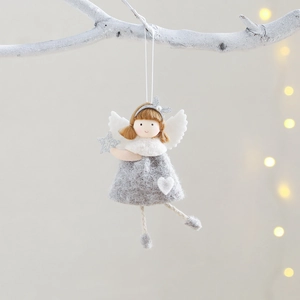 Gray plush angel Christmas tree ornament with silver star headband and white heart detail
