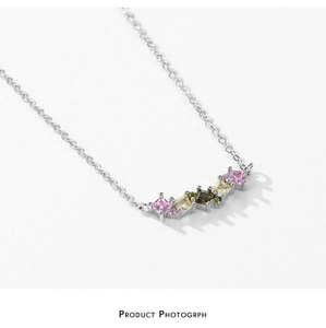 Close-up of S925 sterling silver necklace with colorful geometric zircon gemstones