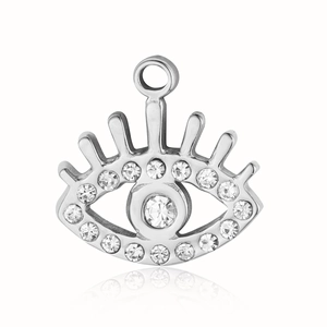 Detailed macro shot of an Evil Eye pendant in stainless steel with sparkling rhinestones
