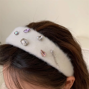 White plush headband with colorful gemstones and silver metal rose for autumn fashion