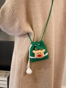Green handmade crochet reindeer crossbody bag with drawstring closure for Christmas