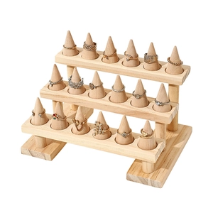 Three-tier solid wood tiered ring display stand with conical holders for jewelry counters