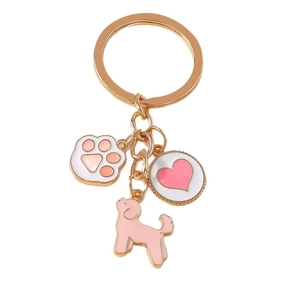Cute golden metal keychain with cartoon paw print, pink dog charm and heart disc pendant
