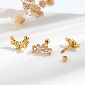 Three-piece gold cartilage stud set with sparkling zircon flowers and screw-back closure