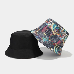 Detail showing the reversible design with solid black and retro 90s graffiti pattern canvas